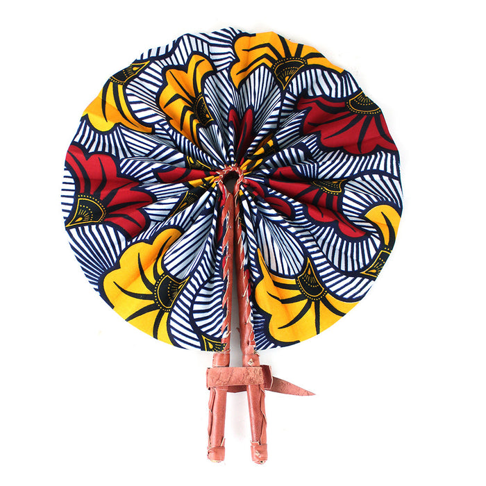 African flower print folding fan made in Ghana