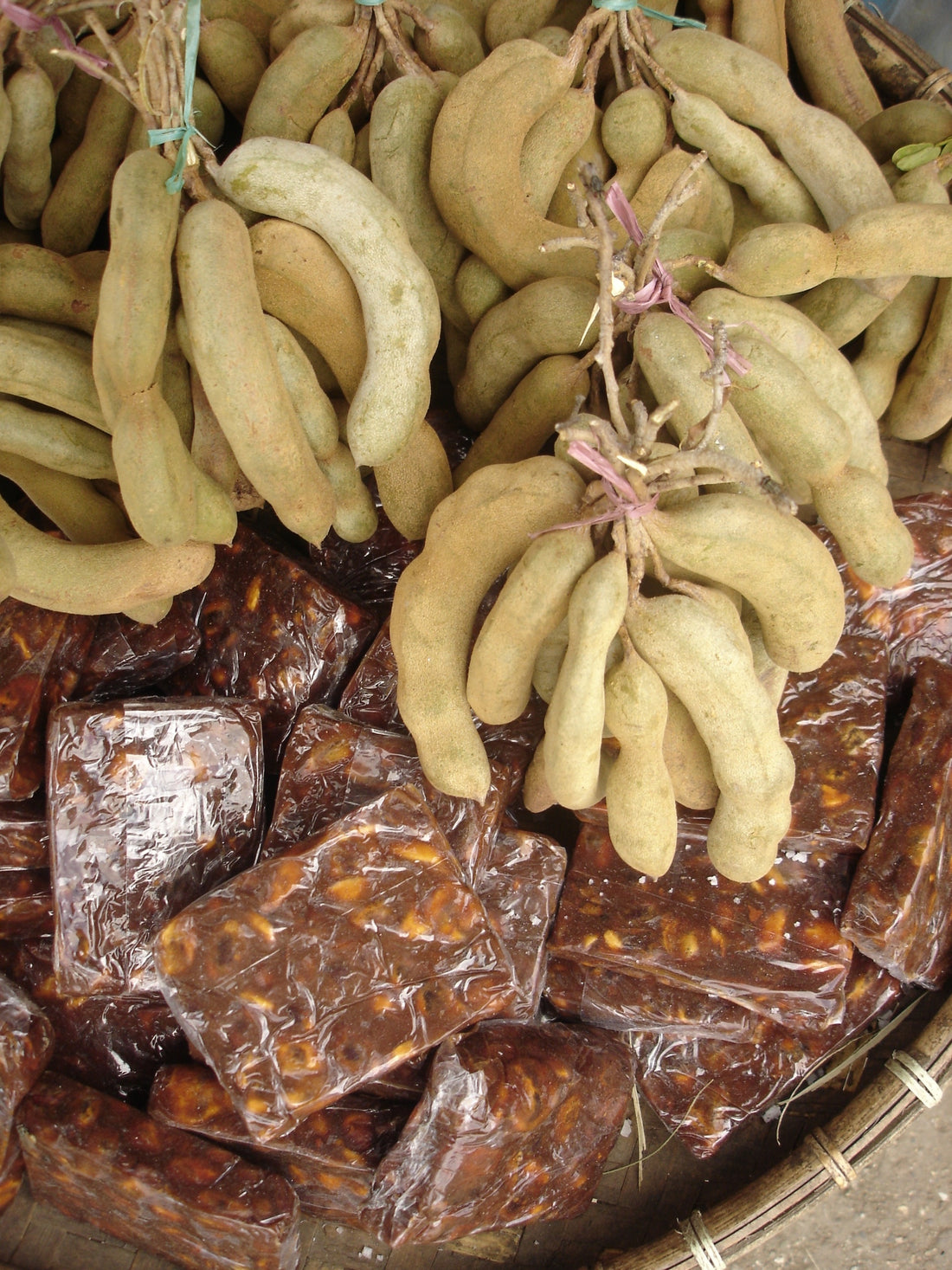 Tamarind pods and pulp — representative ingredient image; packaging may vary