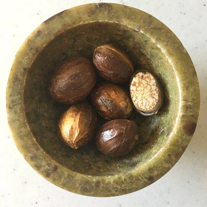 Whole nutmeg — representative ingredient image; packaging may vary